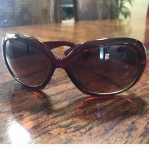 Beautiful dark frame Brown sunglasses.